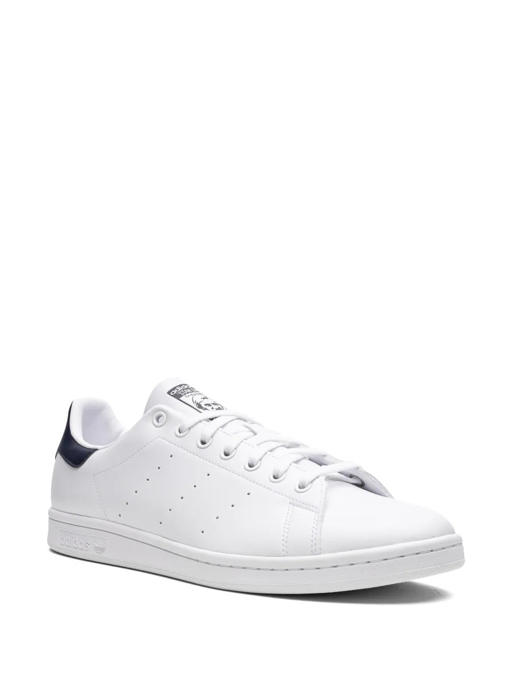 White adidas Stan Smith low-top sneaker side view with perforated toe