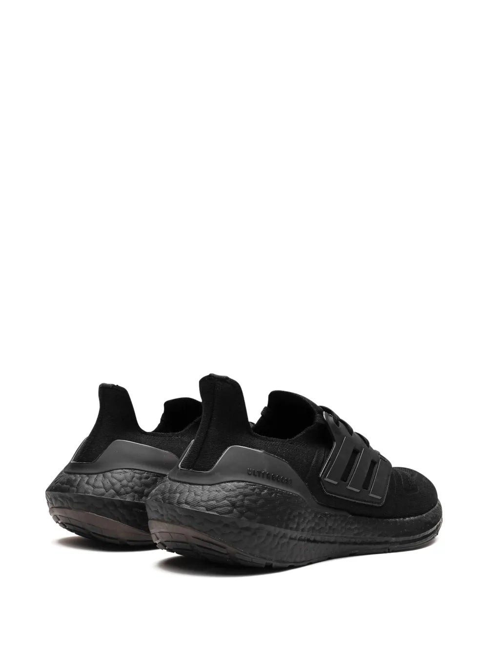 adidas Ultraboost 22 black running sneaker angled side view with molded heel and stripes
