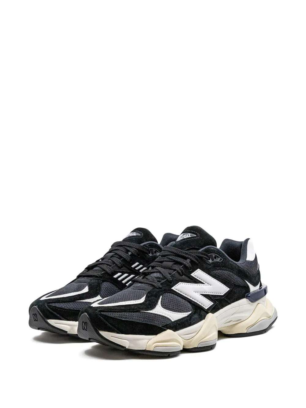 New Balance 9060 black sneakers with white overlays and N logo, lace-up style