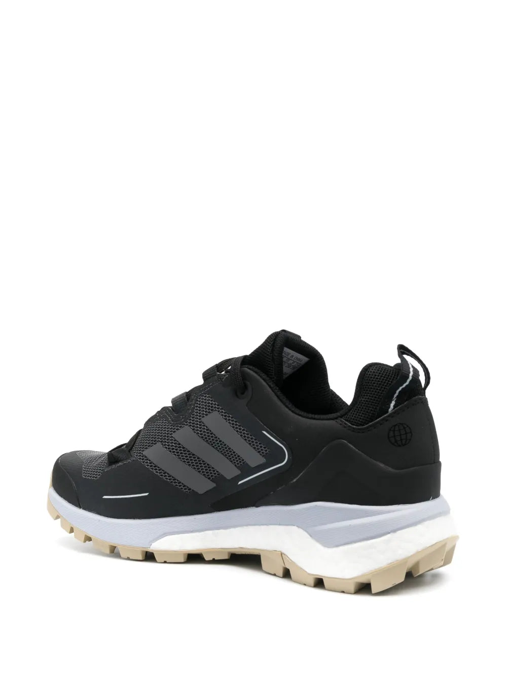 Black adidas low-top sneakers, angled side view, mesh upper, white midsole
