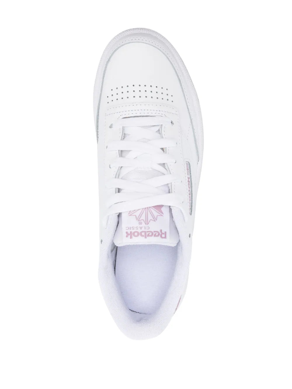 White low-top sneaker front view with lace eyelets and logo on tongue