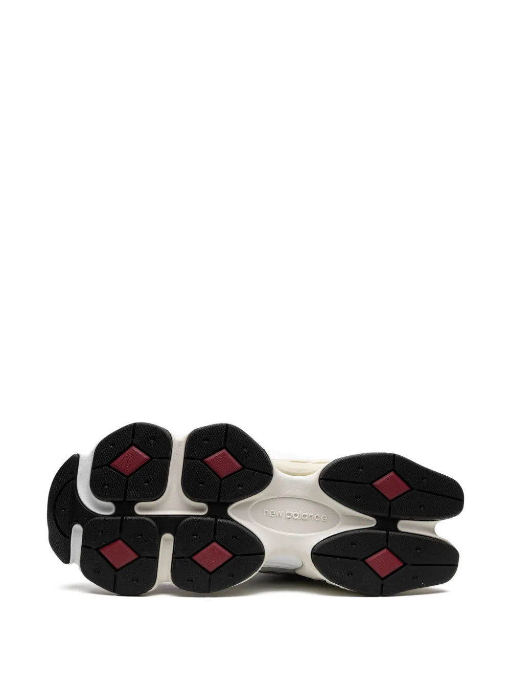 New Balance 9060 sneakers outsole view with black traction pads