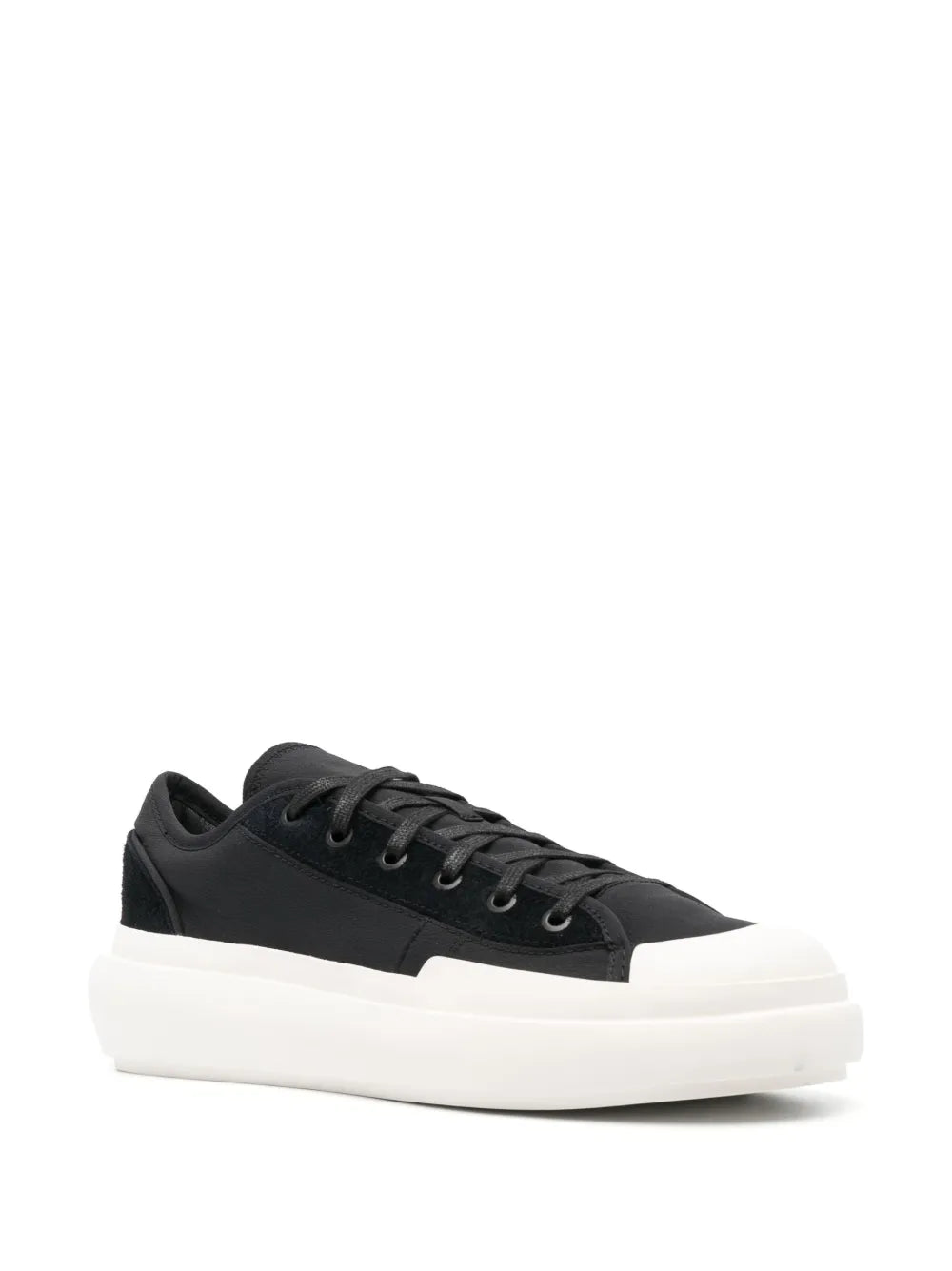 Black low-top lace-up court sneaker, side view with white sole