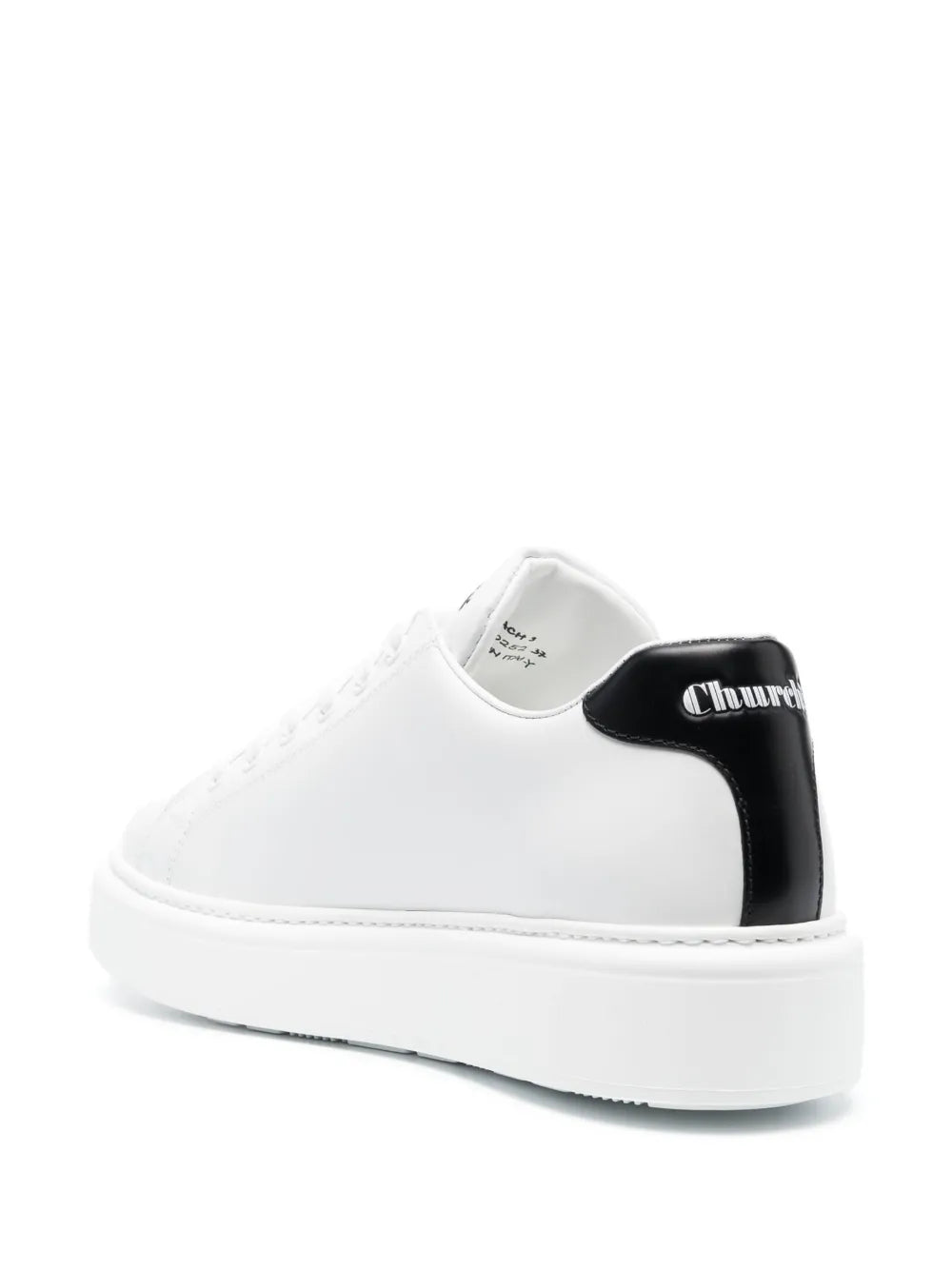 White low-top sneakers with black heel collar and Church's logo on the back