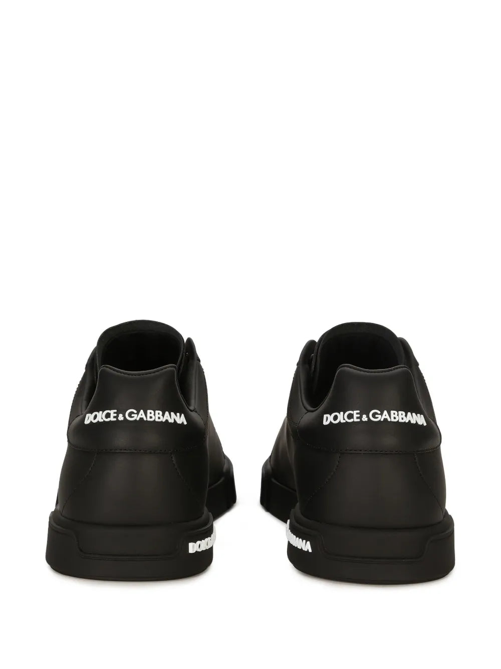 Black low-top sneakers, back view, with Dolce & Gabbana heel logo
