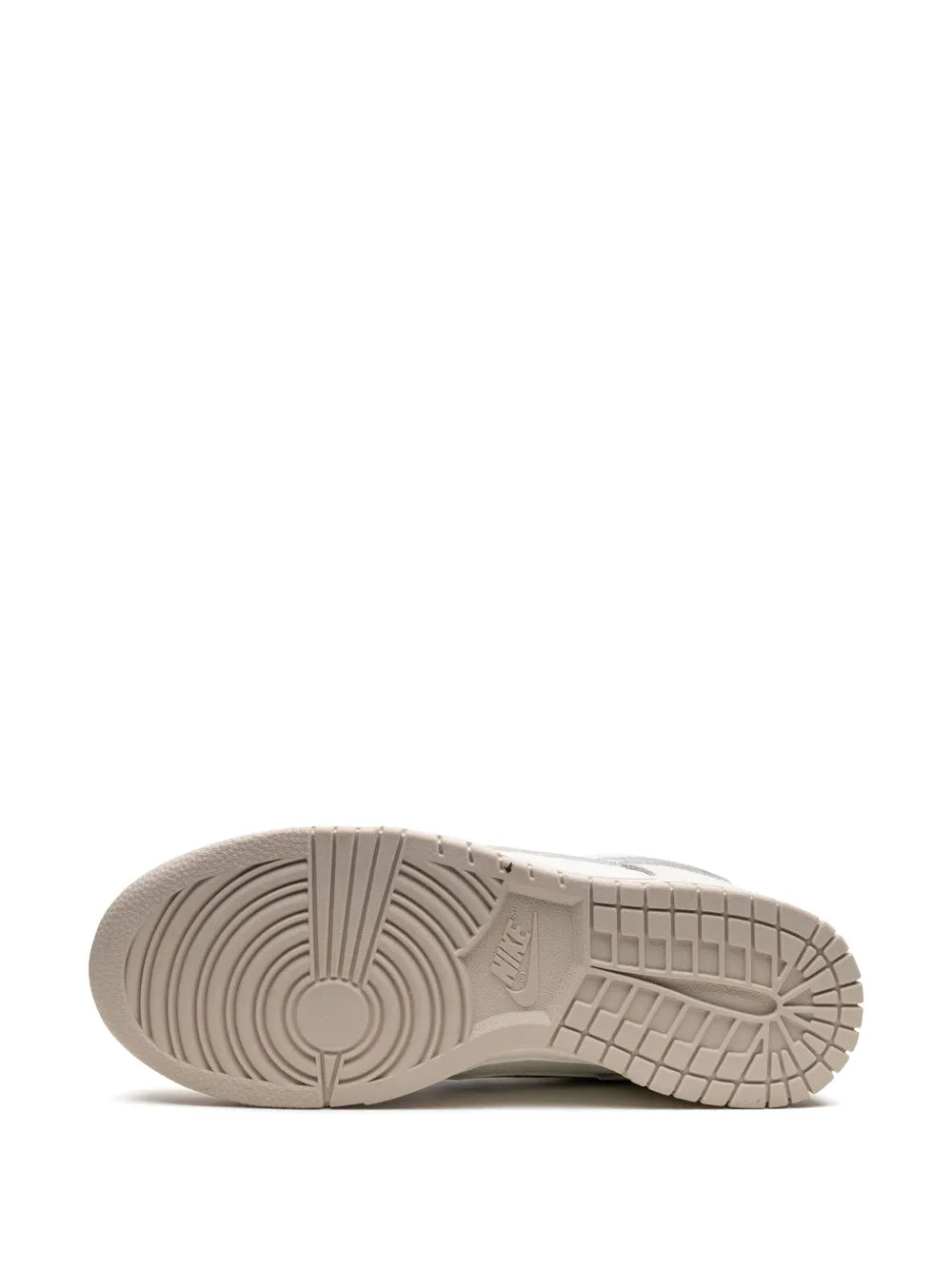 Nike Dunk Low outsole, off-white rubber tread with circular traction pattern
