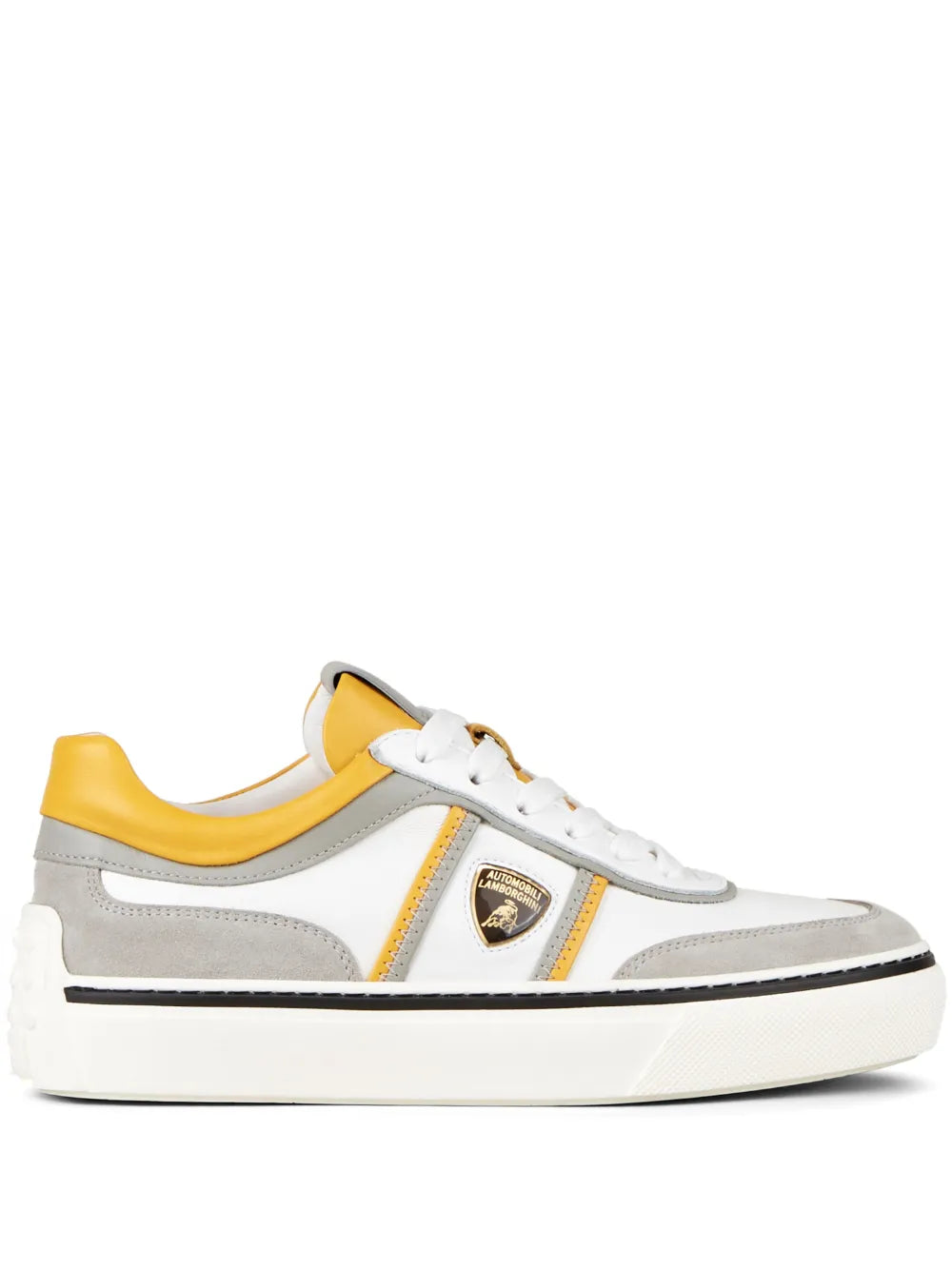 White low-top leather-look sneaker with yellow lining and gray side stripe, lace-up.
