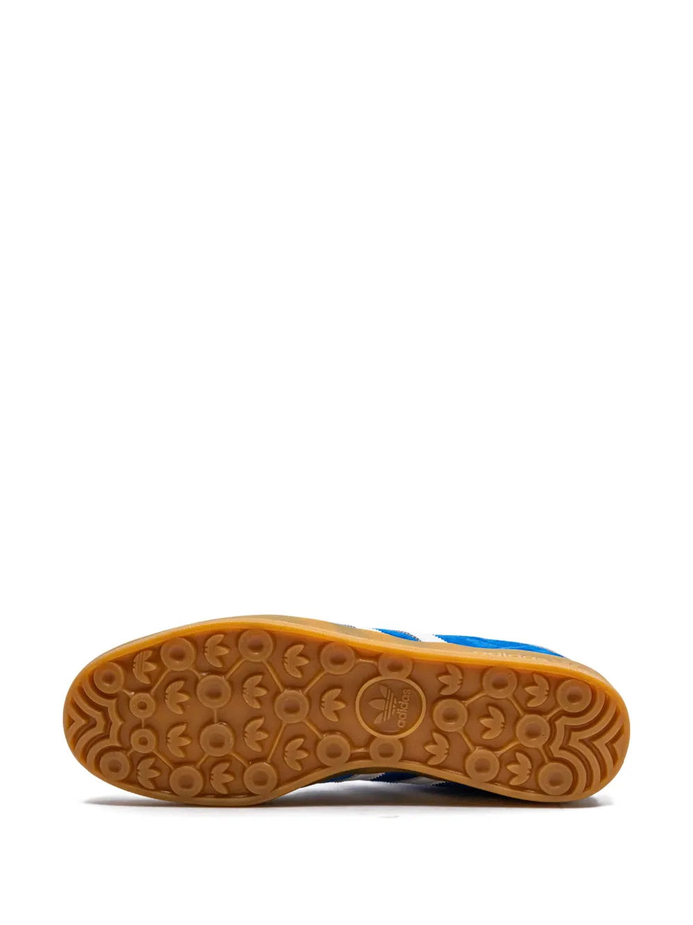 Gum rubber outsole for blue adidas indoor sneakers with circular tread pattern