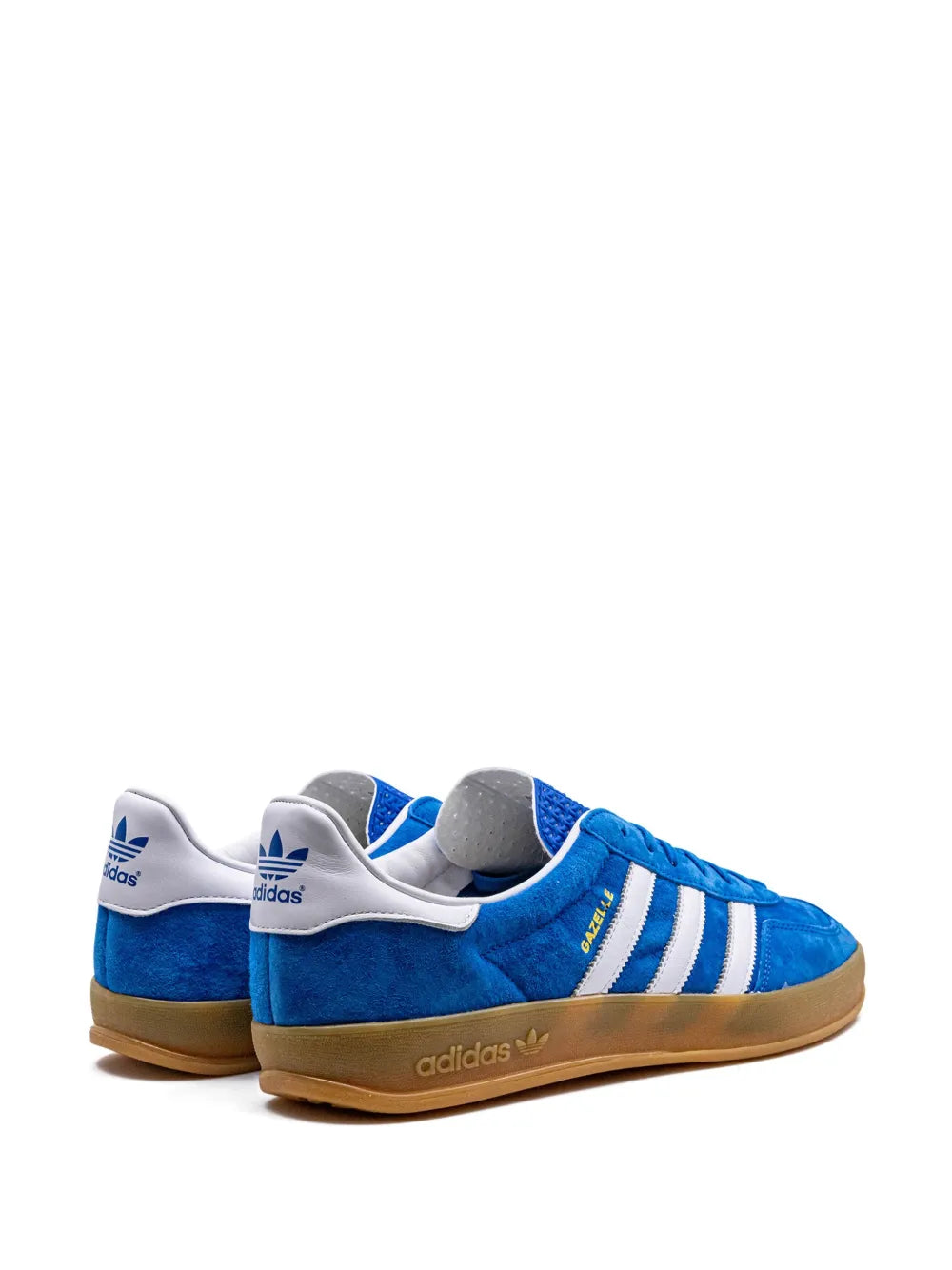 Blue adidas indoor sneakers, heel view with white stripes and gum outsole