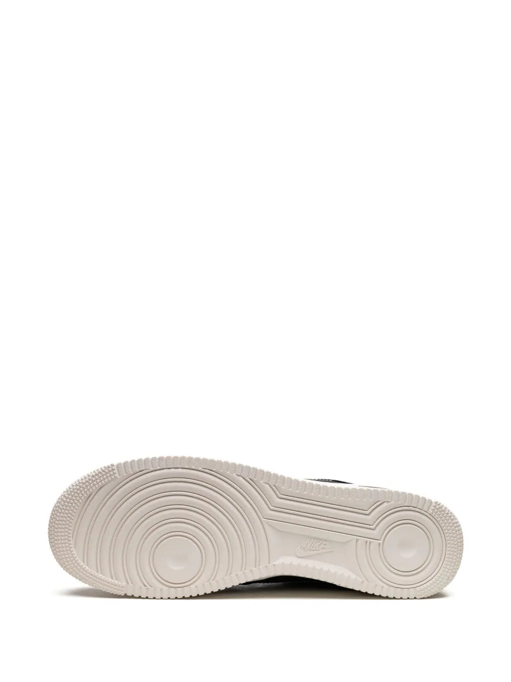 White rubber outsole tread for black low-top sneakers