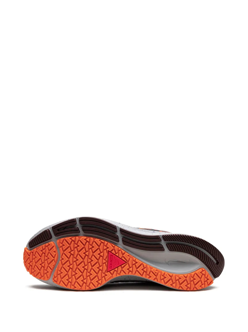 Nike running shoe outsole with orange tread pattern and dark rubber edges