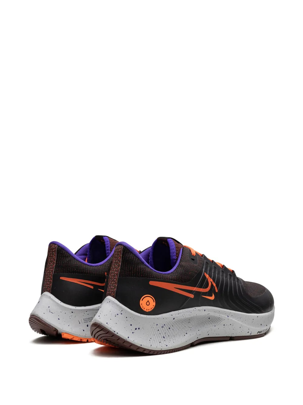 Nike running shoe heel and side with purple collar lining, orange accents, speckled midsole
