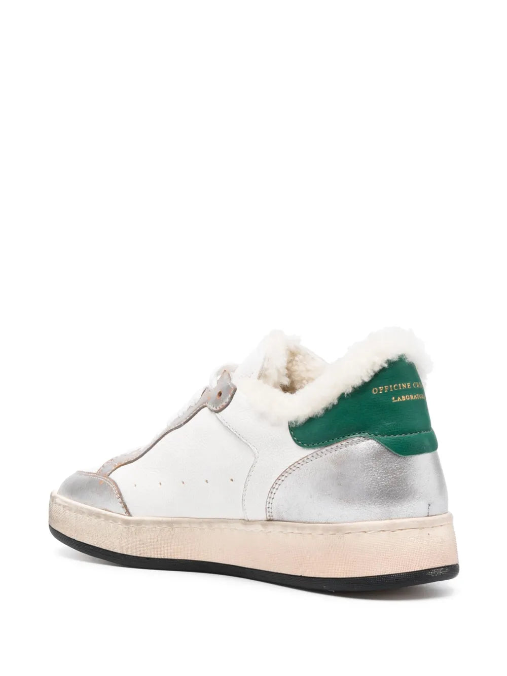 White and silver leather sneaker with green trim, lace-up, chunky sole, fur collar