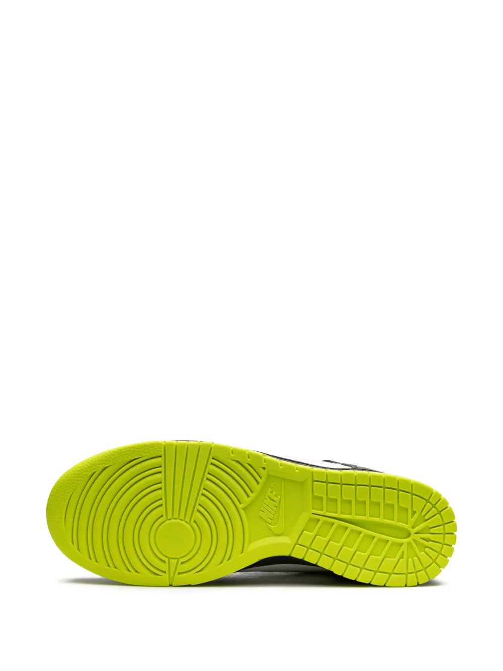 Neon green sneaker outsole with circular traction grooves