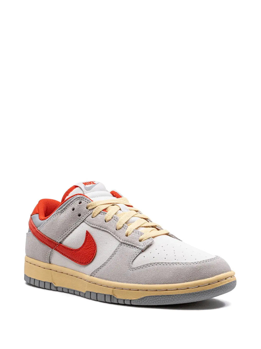 Low-top sneakers, light gray upper with red swoosh and tan lace