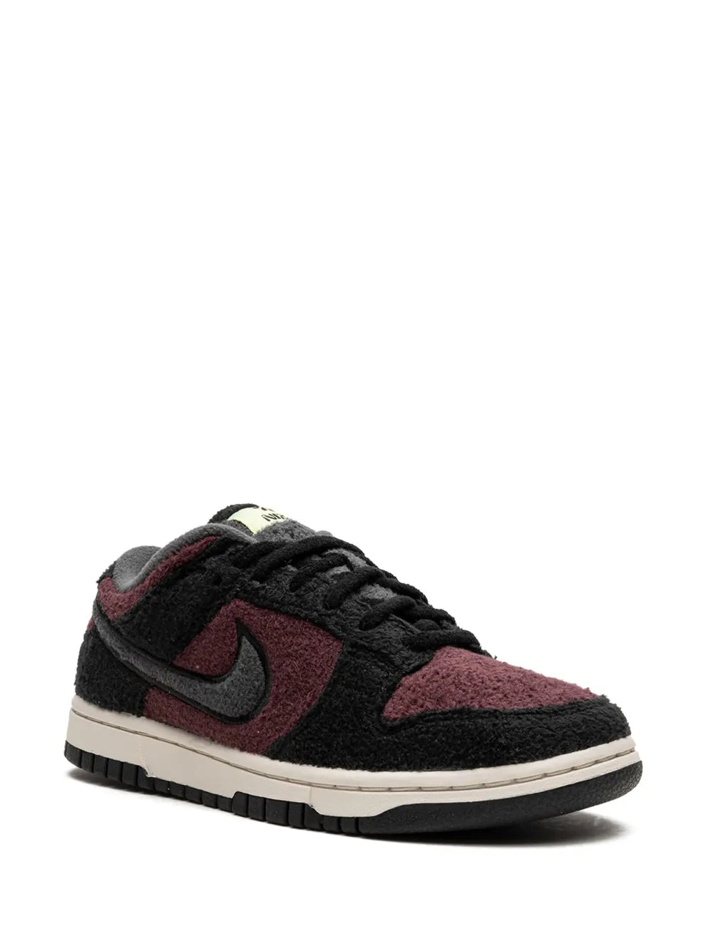 Black and burgundy Nike low-top sneaker, side view with lace-up and Swoosh