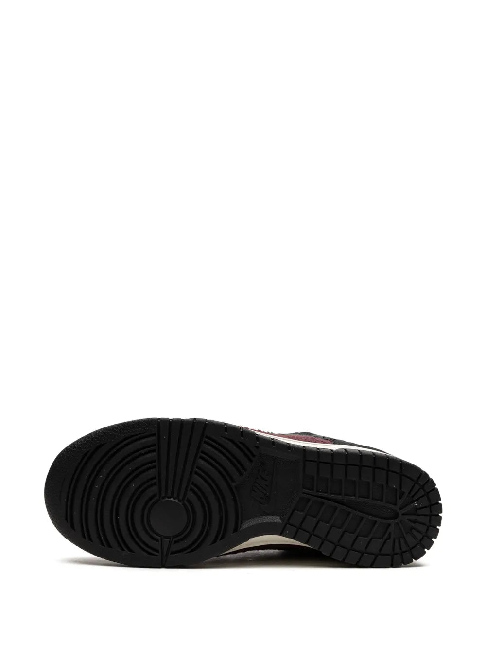 Black rubber outsole with tread pattern for Nike low-top sneaker
