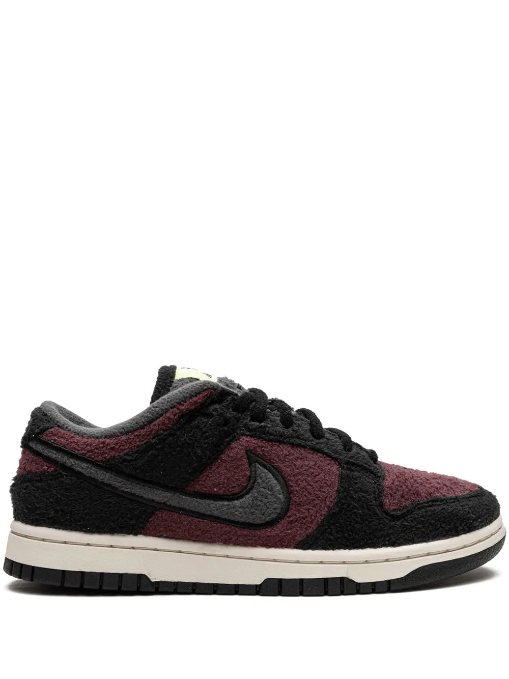 Black low-top sneakers with burgundy panel and Nike Swoosh, lace-up