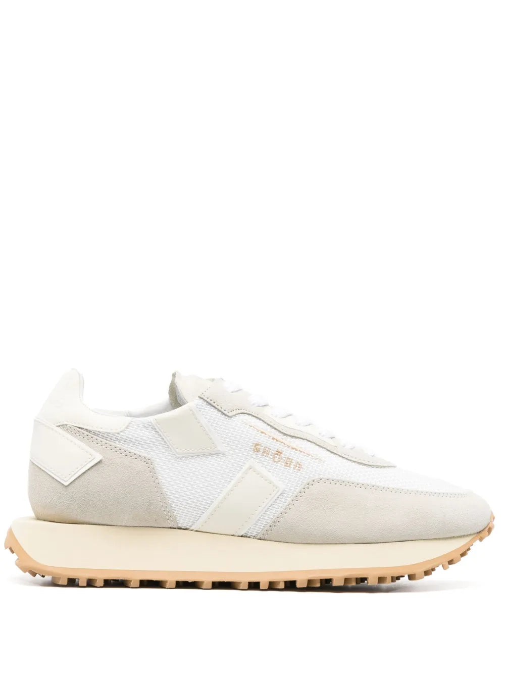 White logo-embossed low-top sneaker with gum rubber sole and lace-up front