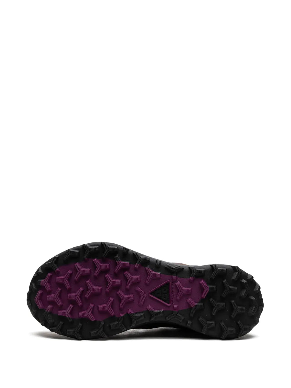 Nike ACG low sneaker outsole with dark tread and purple traction pattern