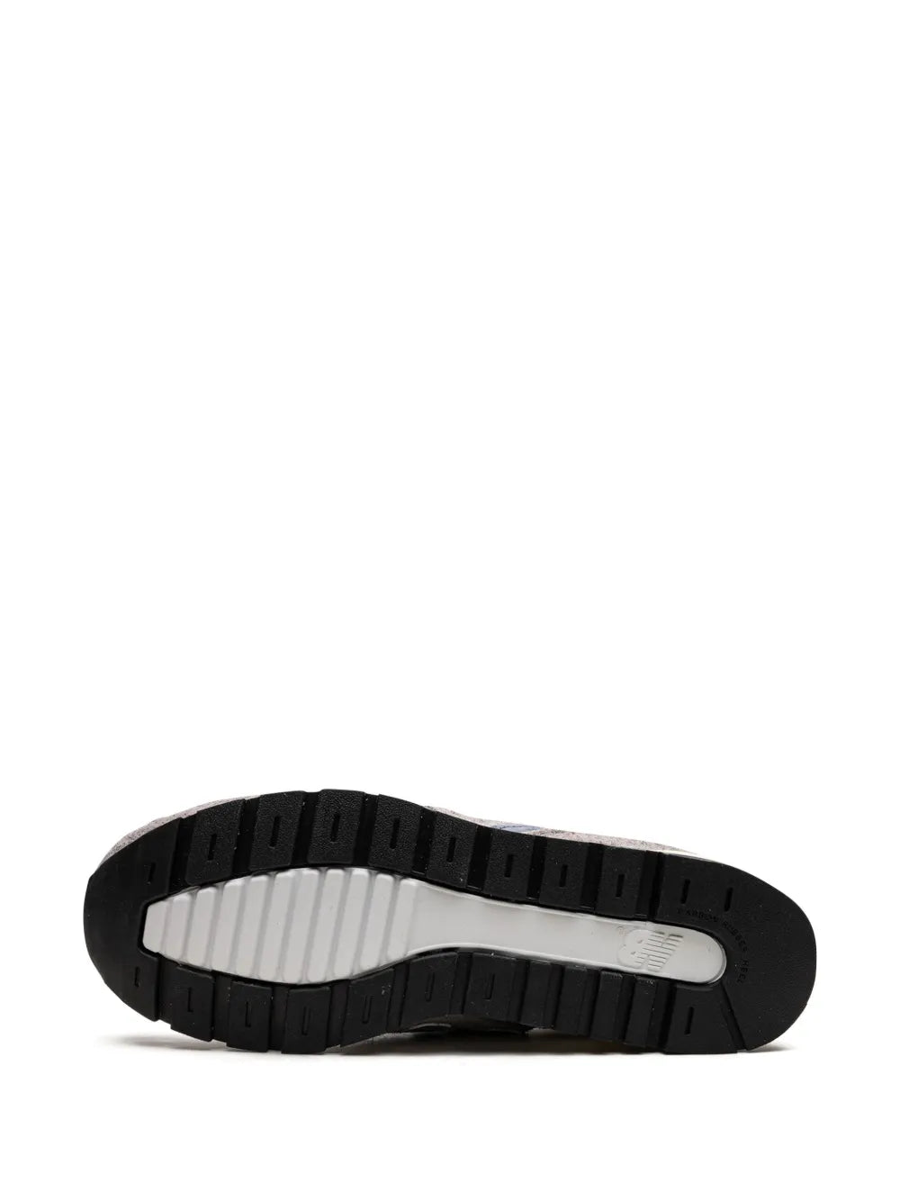 New Balance 996 sneaker outsole, black rubber tread with light midfoot panel