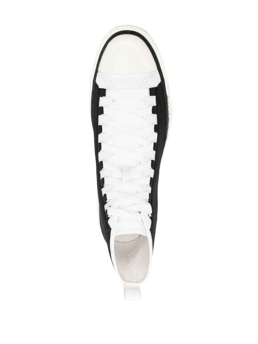 Black and white high-top sneakers, front view with white laces and rubber sole edge