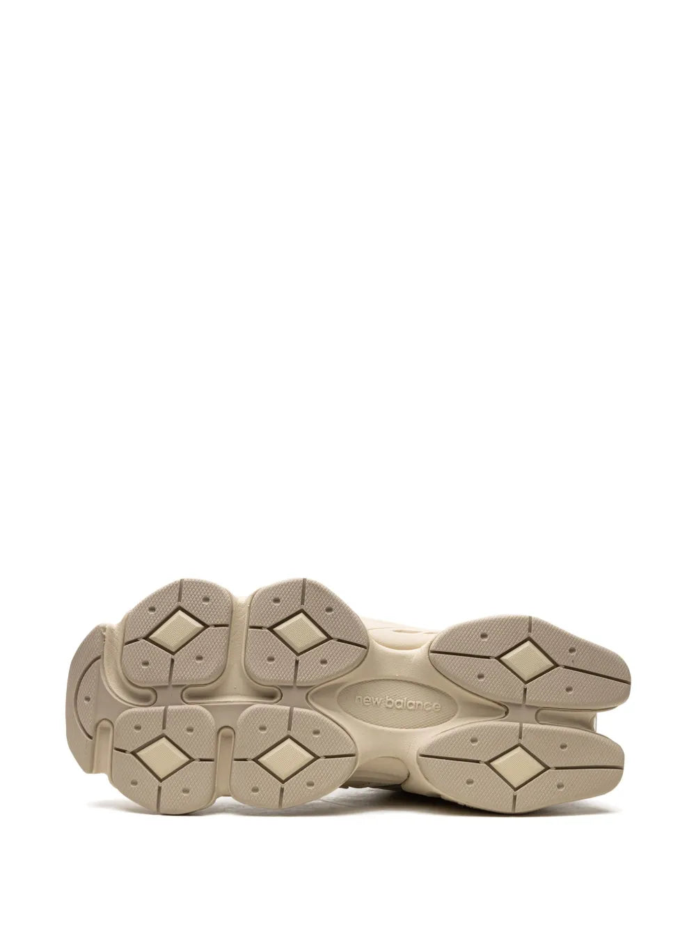 Beige New Balance 9060 low-top sneaker outsole, tread pattern view