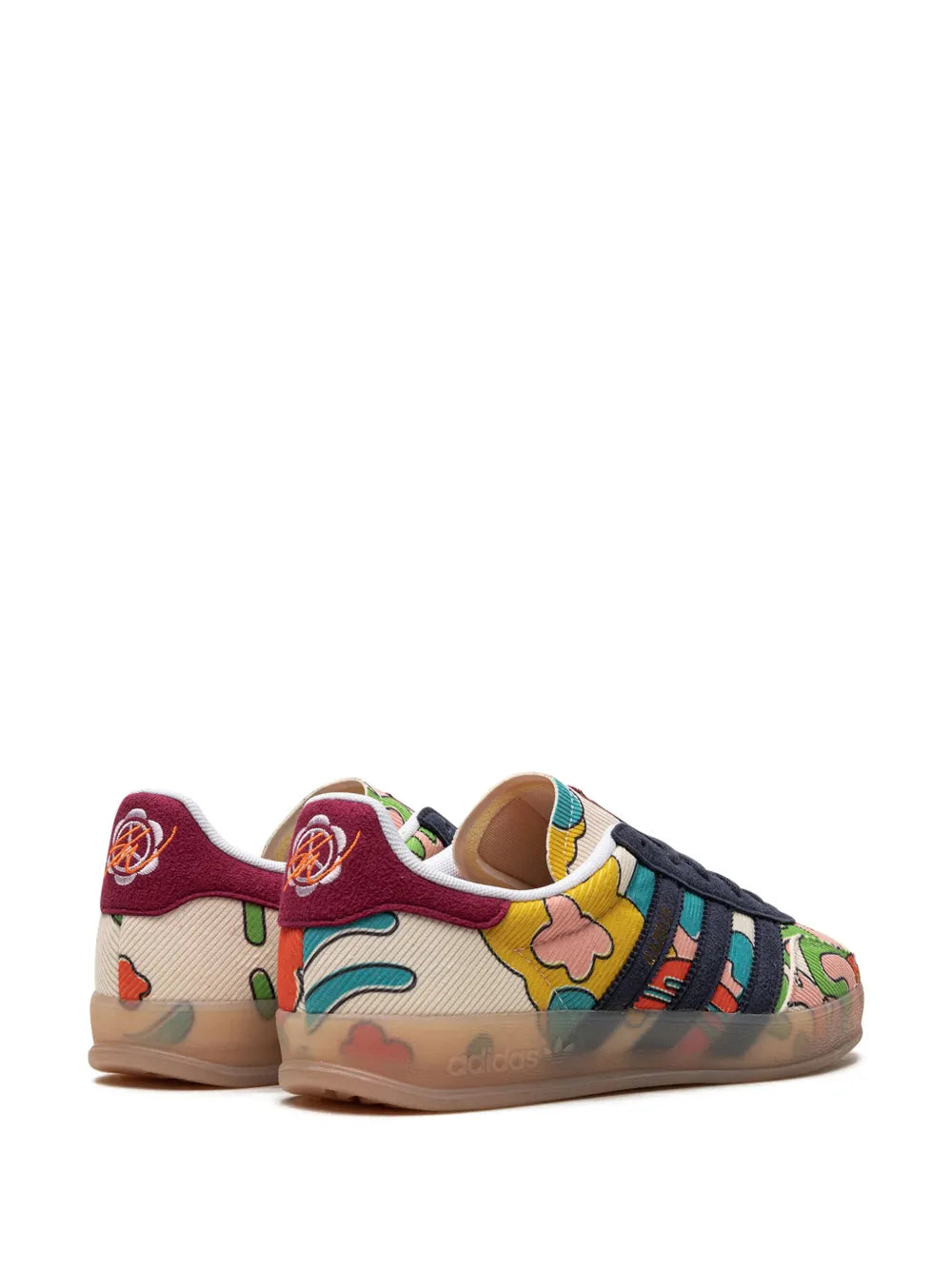 adidas Gazelle indoor sneakers showing heel and laces, multicolor artwork with gum sole