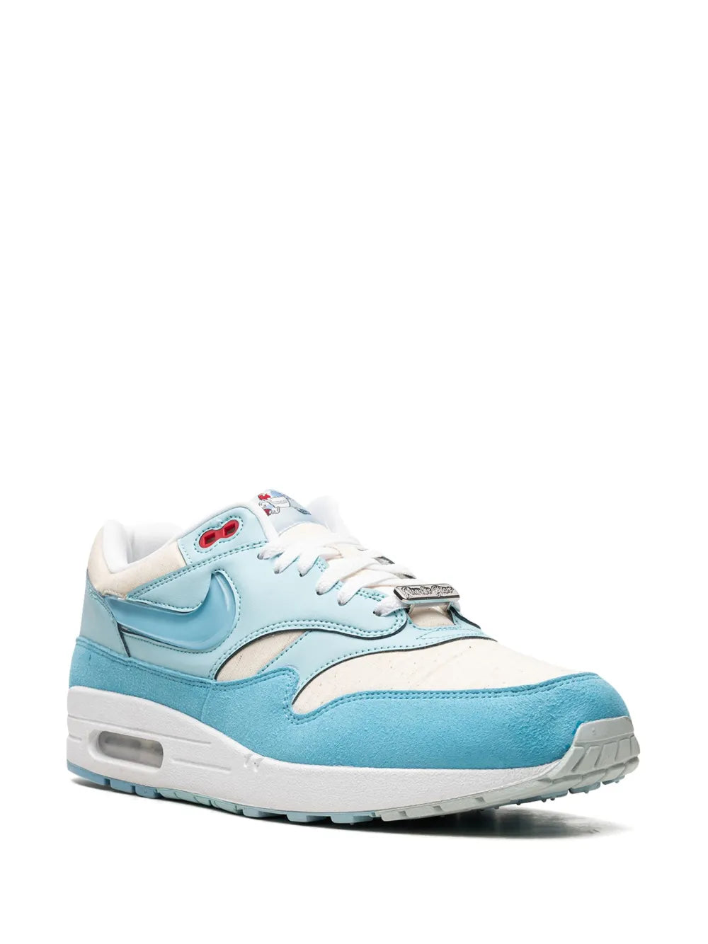 Light blue and white sneakers with sky-blue overlays and visible Air Max sole window