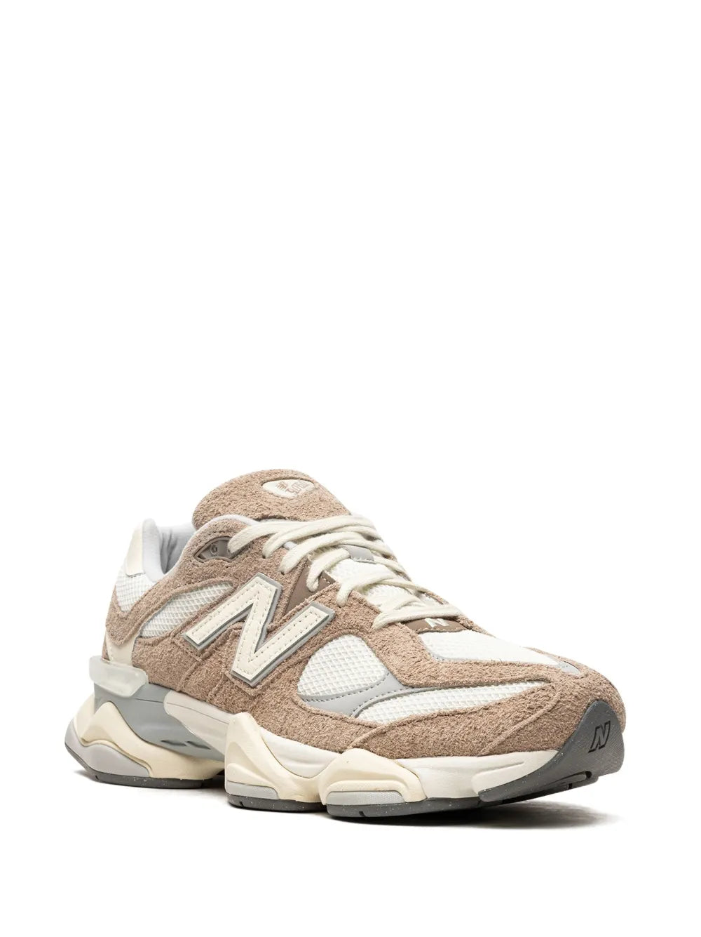 Beige and white lace-up sneaker with N logo, chunky cushioning midsole.
