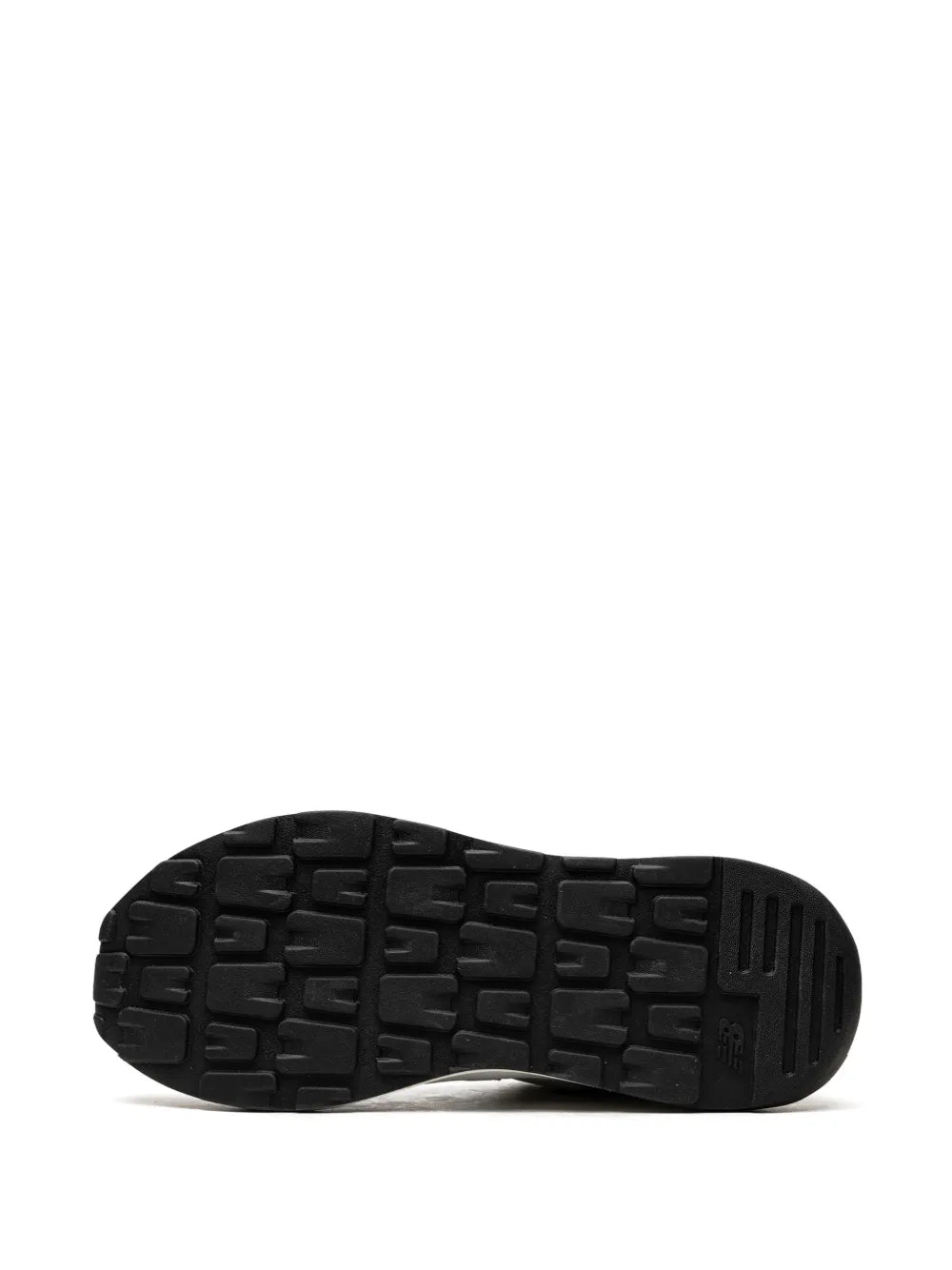 New Balance 57/40 sneaker outsole, black rubber tread with logo