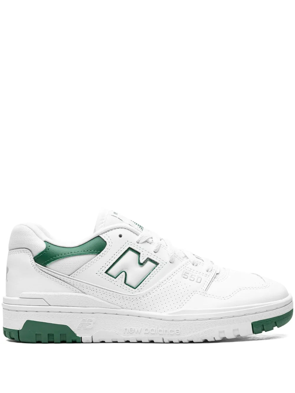 White low-top sneakers with green N logo, lace-up front, and textured sole