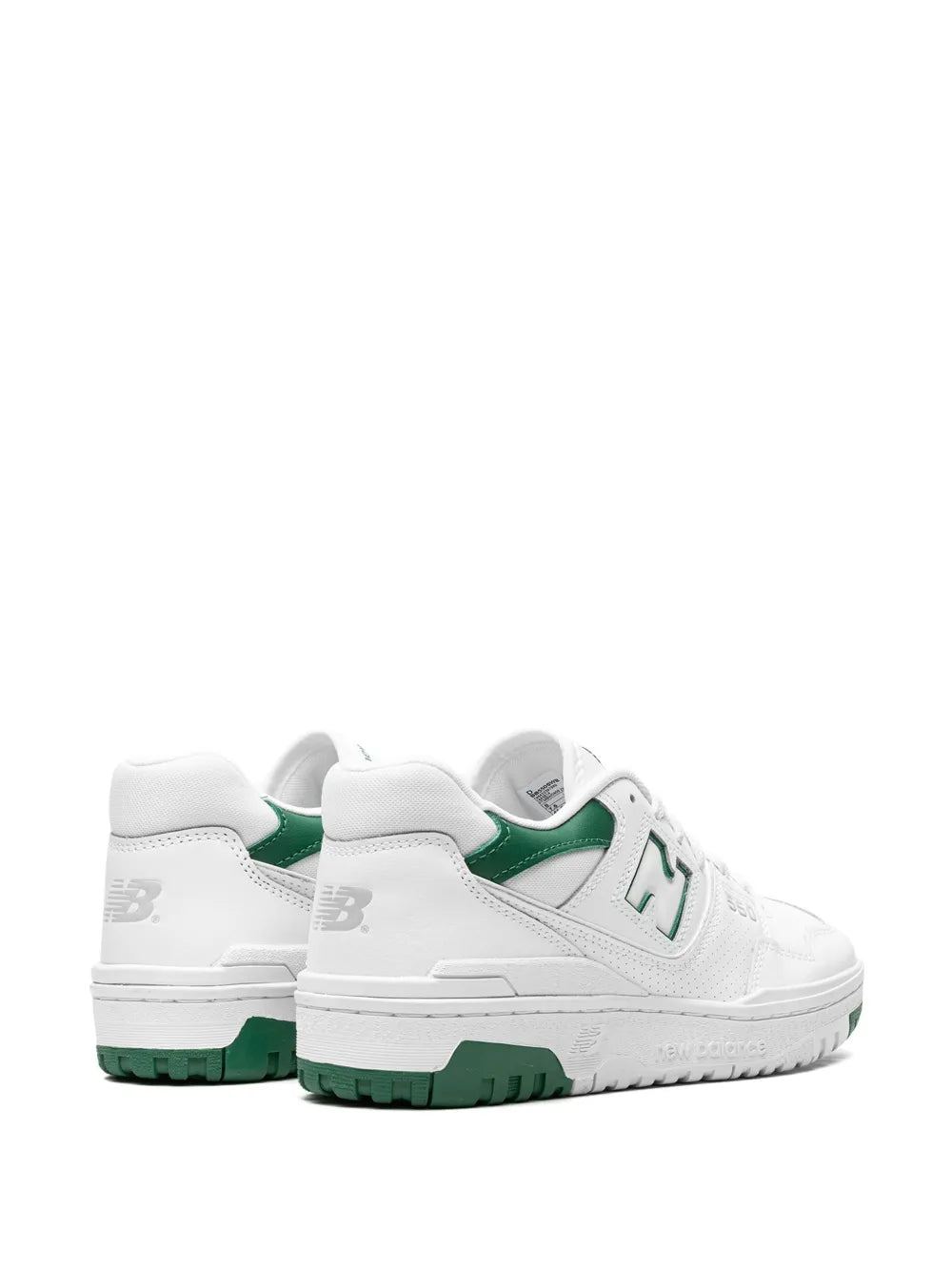 Pair of white low-top sneakers with green N logos and green outsole tread