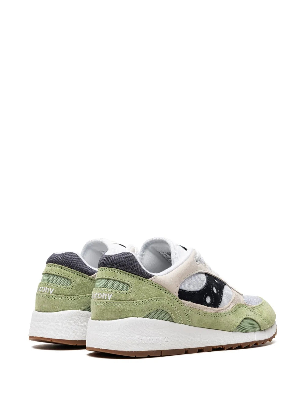 Green and white low-top sneaker with black emblem, padded collar, rear view