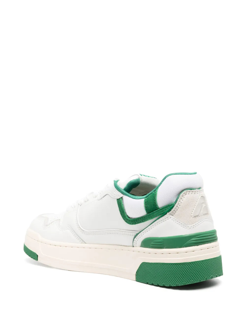White leather low-top sneakers with green heel tab and rear panel, lace-up