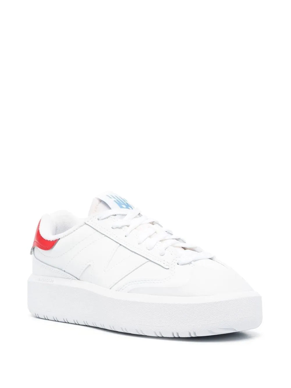 White low-top sneakers, side view with blue accent and red collar trim, lace-up