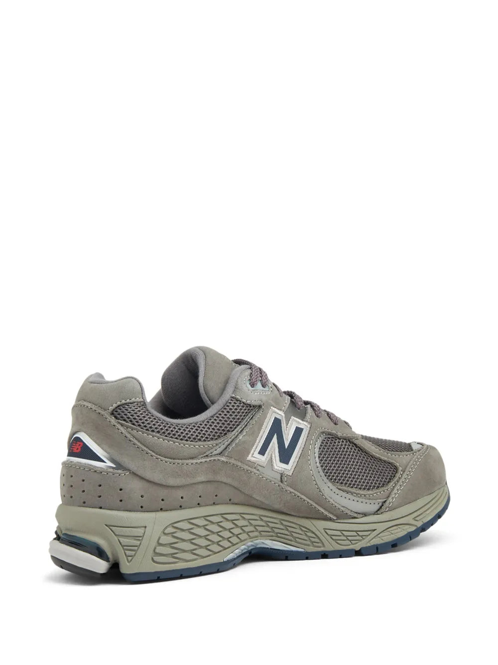 Ash grey New Balance 2002R sneakers, rear/side view with heel collar and blue accent sole