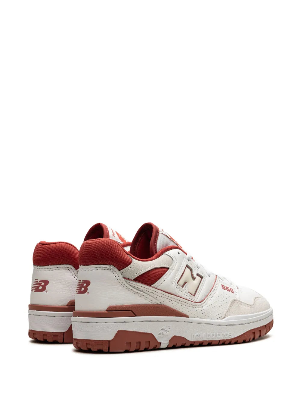 Pair of white sneakers with red heel and side panel, New Balance logo, brown sole