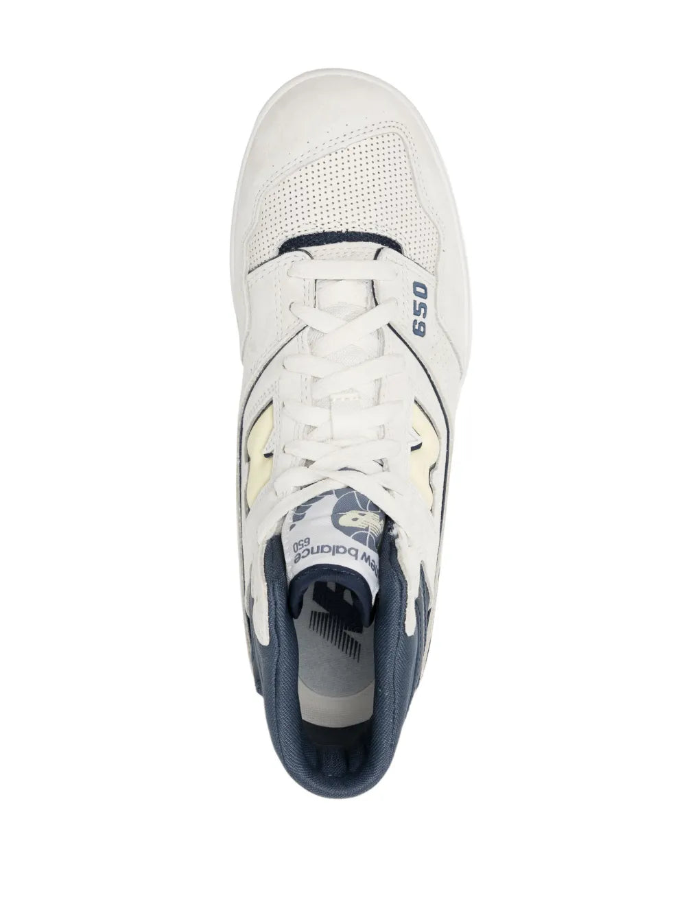 High-top sneakers off-white toe and navy interior, lace-up front view