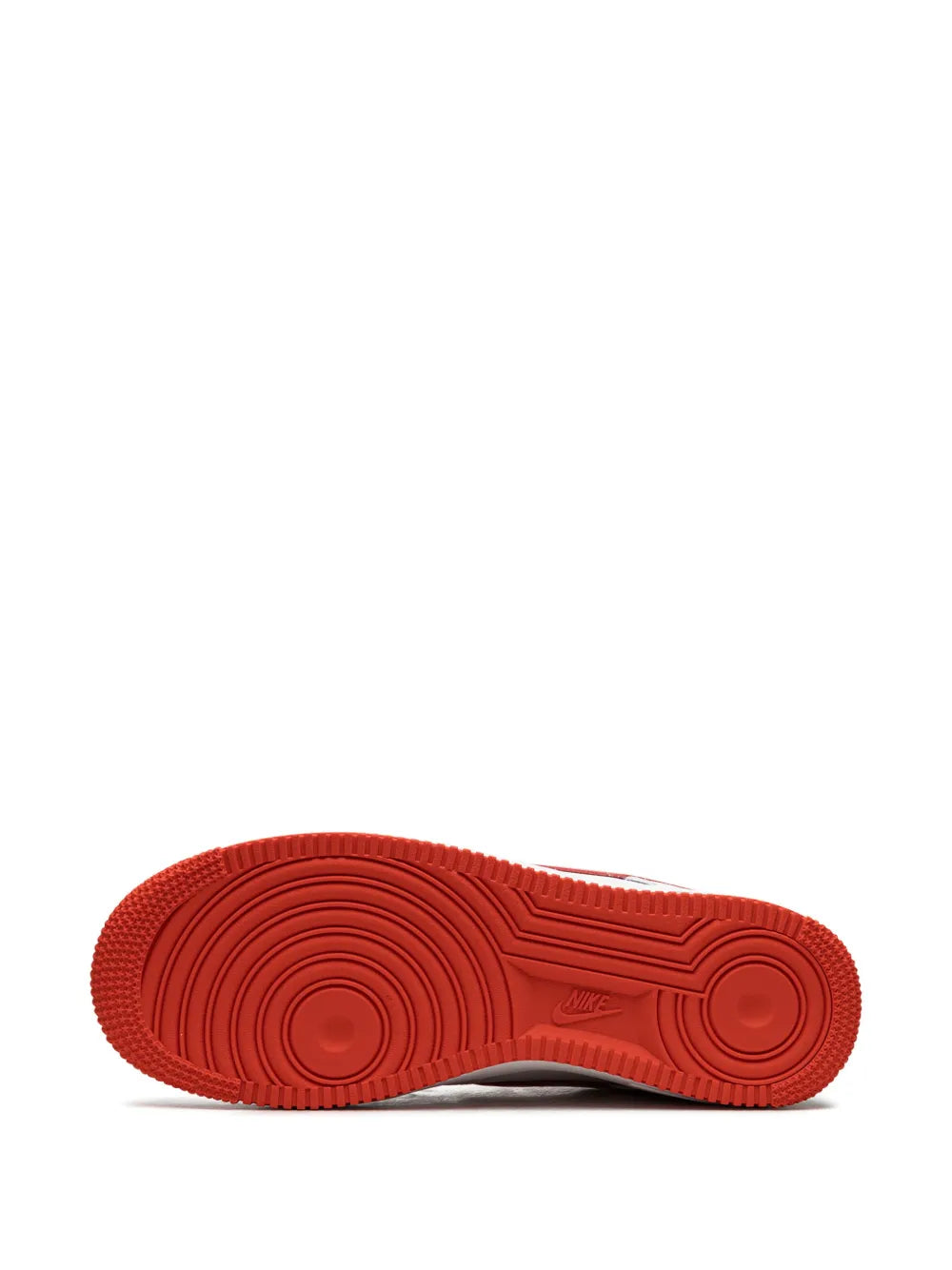 Red rubber Nike Air Force 1 Low outsole with circular tread pattern