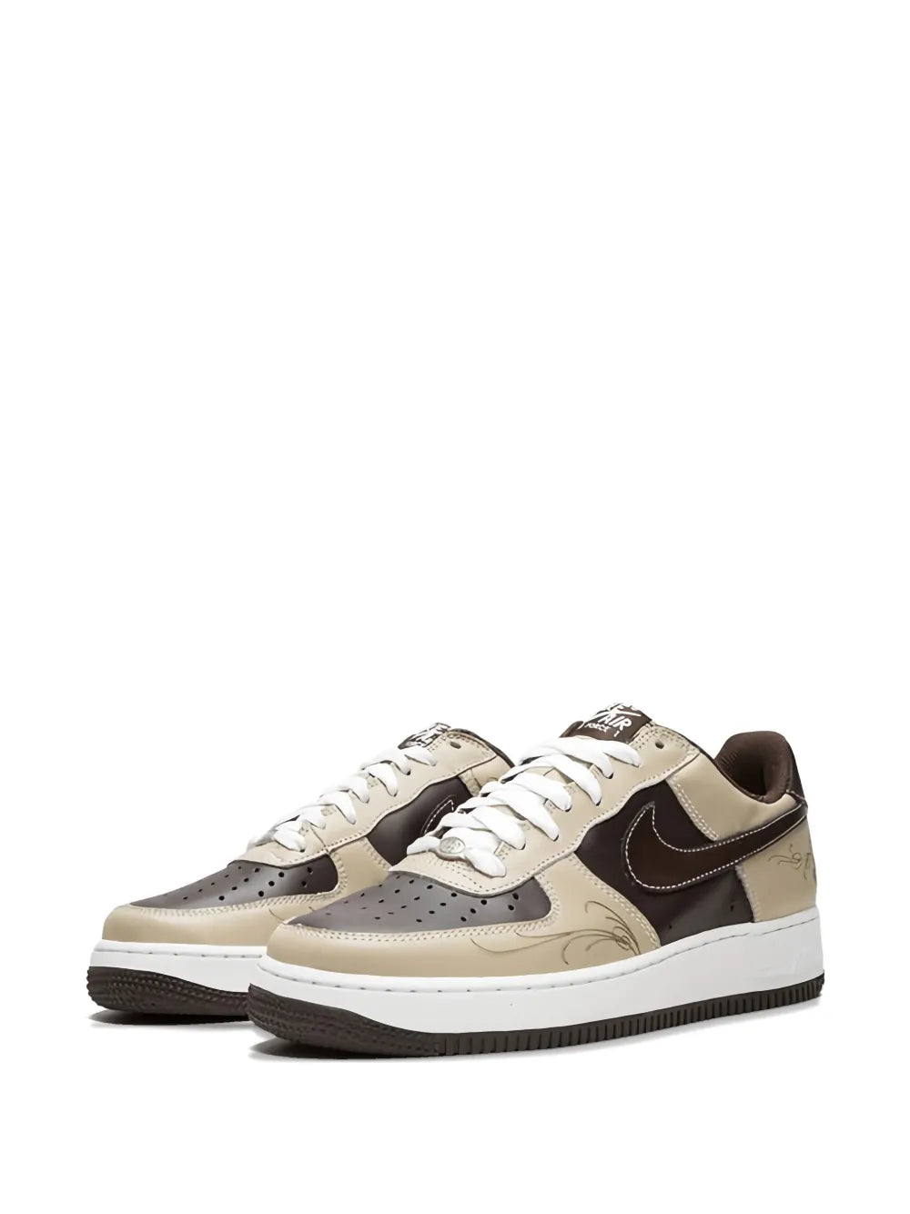 Pair of Nike Air Force 1 beige leather sneakers with black swoosh and white laces