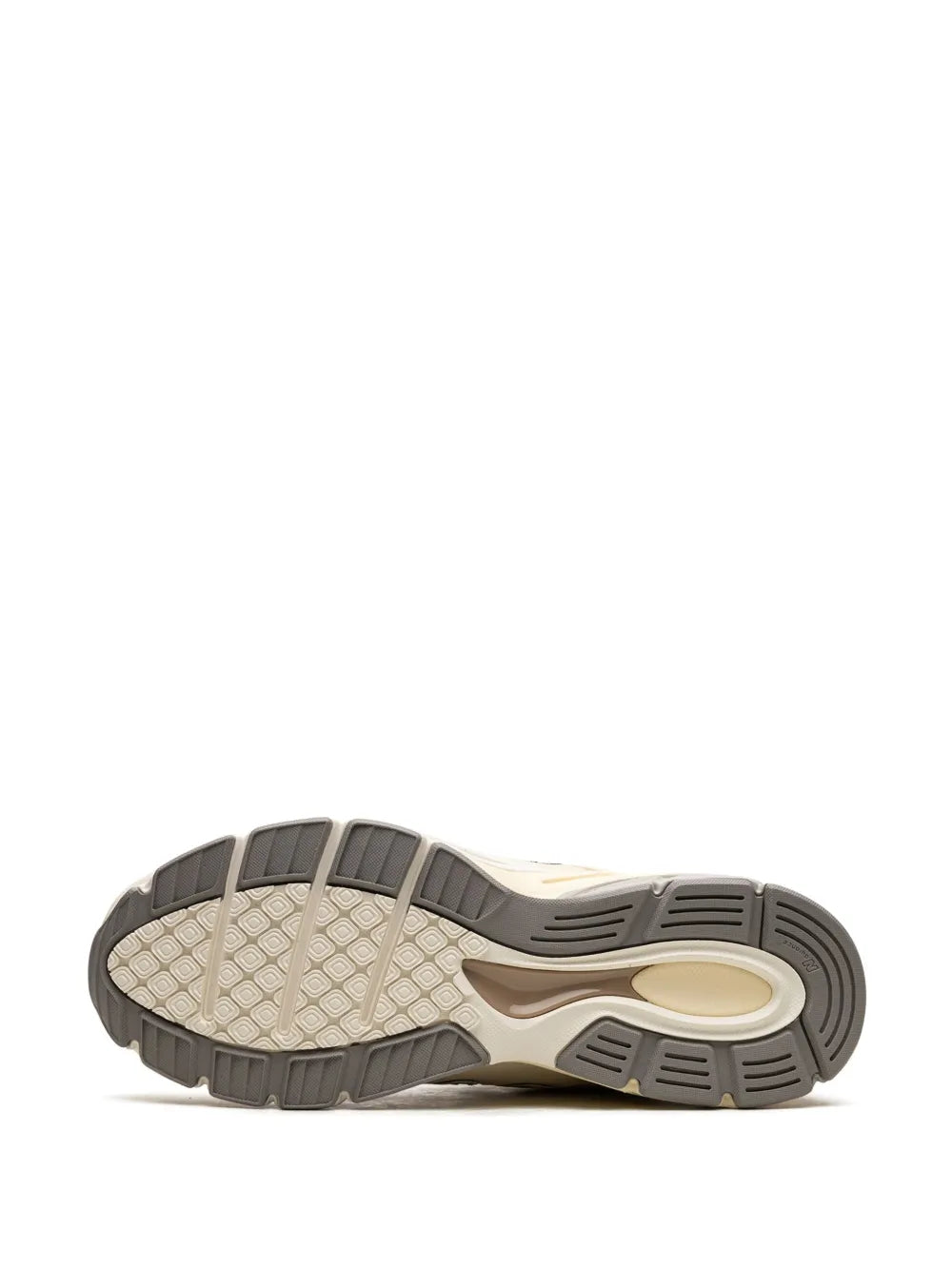 New Balance 990v4 cream sneakers, outsole tread and rubber pods view