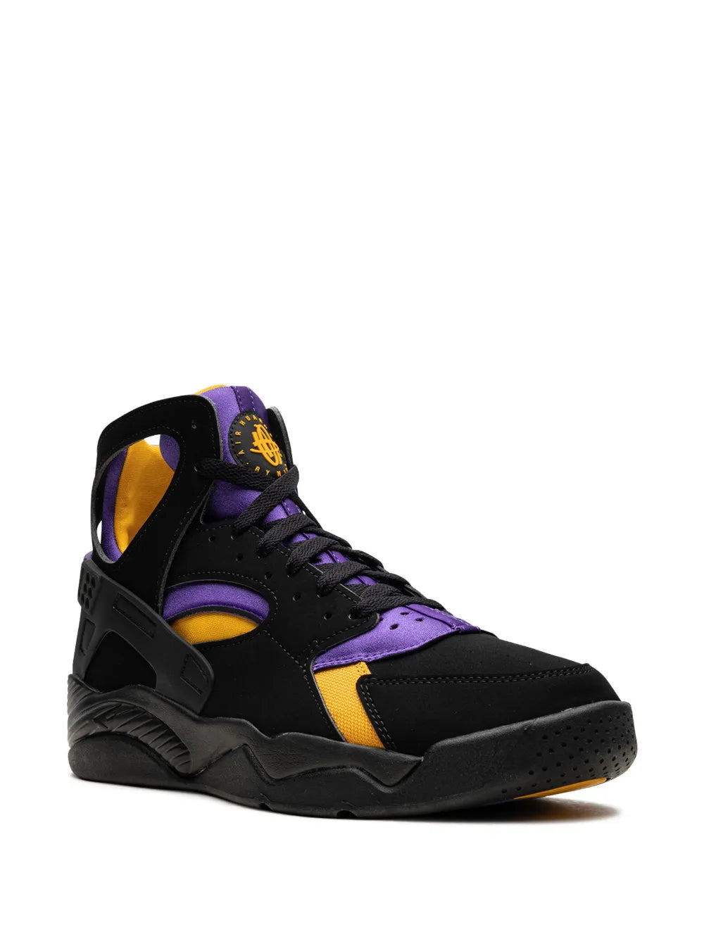 Nike mid-top sneakers, black with purple panels and orange accents, side view