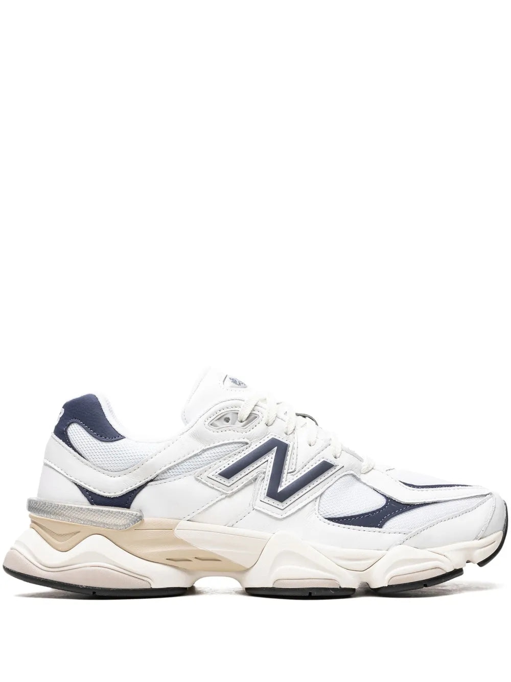 New Balance 9060 white sneakers with navy accents and cream sole