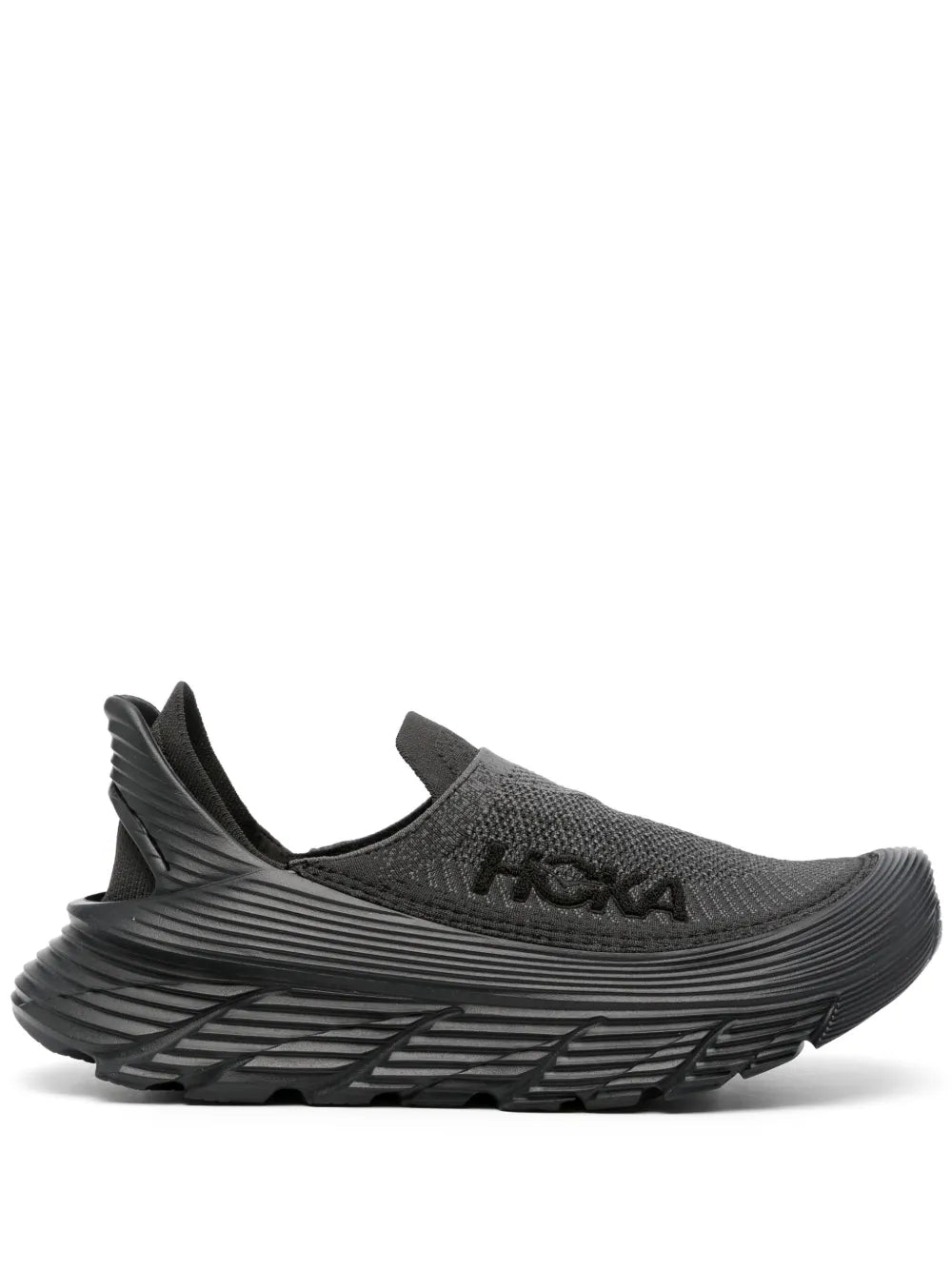 Black slip-on knit sneakers with HOKA logo and ridged foam sole