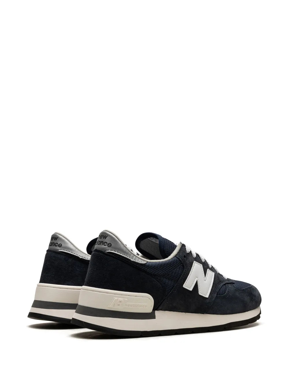 Navy New Balance 990 V1 sneakers, side and heel view with white N and cream trim