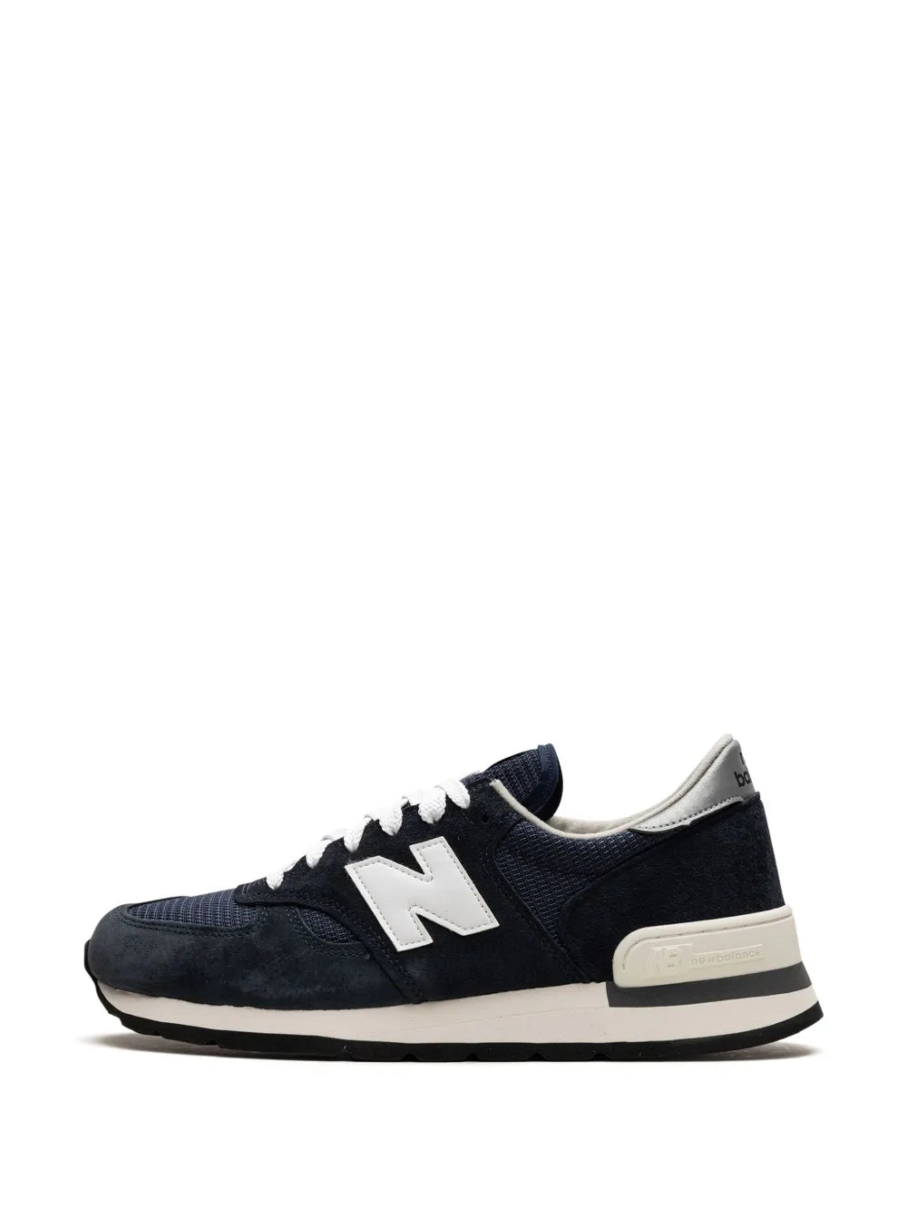 Navy New Balance 990 V1 sneaker, front 3/4 view with white N and cream heel stripe