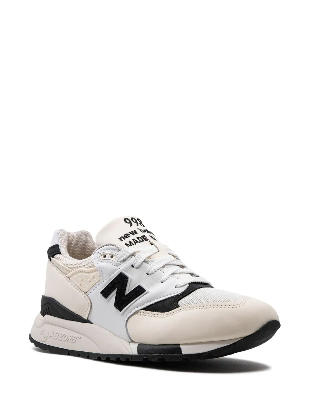 Made-in-USA sneakers with white upper, black N logo, lace-up and padded collar