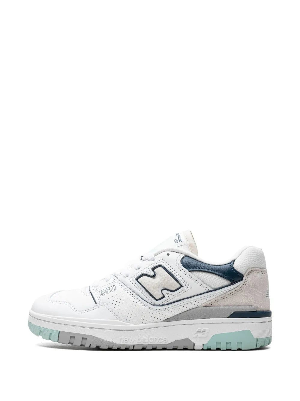 White low-top sneakers with navy accent and light gray toe panel, side angle