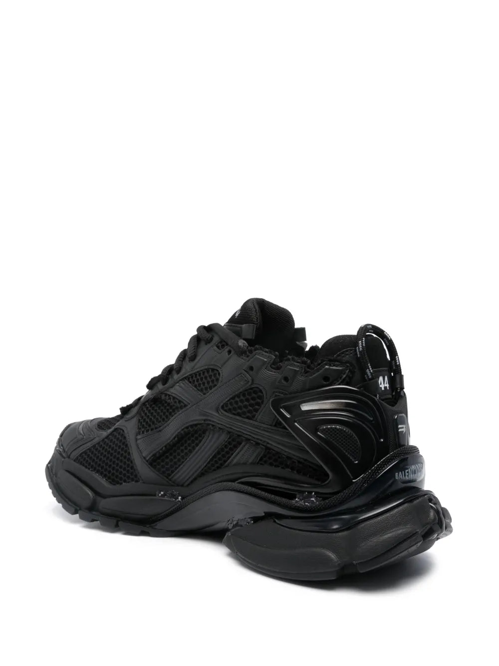 Balenciaga black chunky low-top sneakers with side strap detail and deep tread sole